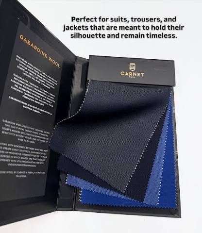 An open Carnet gabardine bunch showing navy and mid-blue suiting cloth